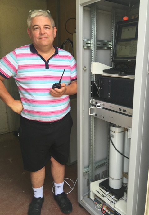Tony, G0MBA standing in front of the recently installed GB7TE repeater.
